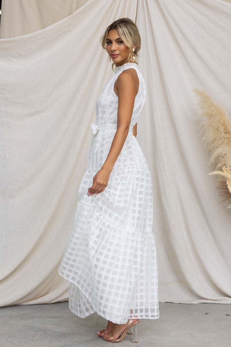White Aspiring Maxi Dress with high neckline and elastic waistband, featuring a removable belt and lined design.