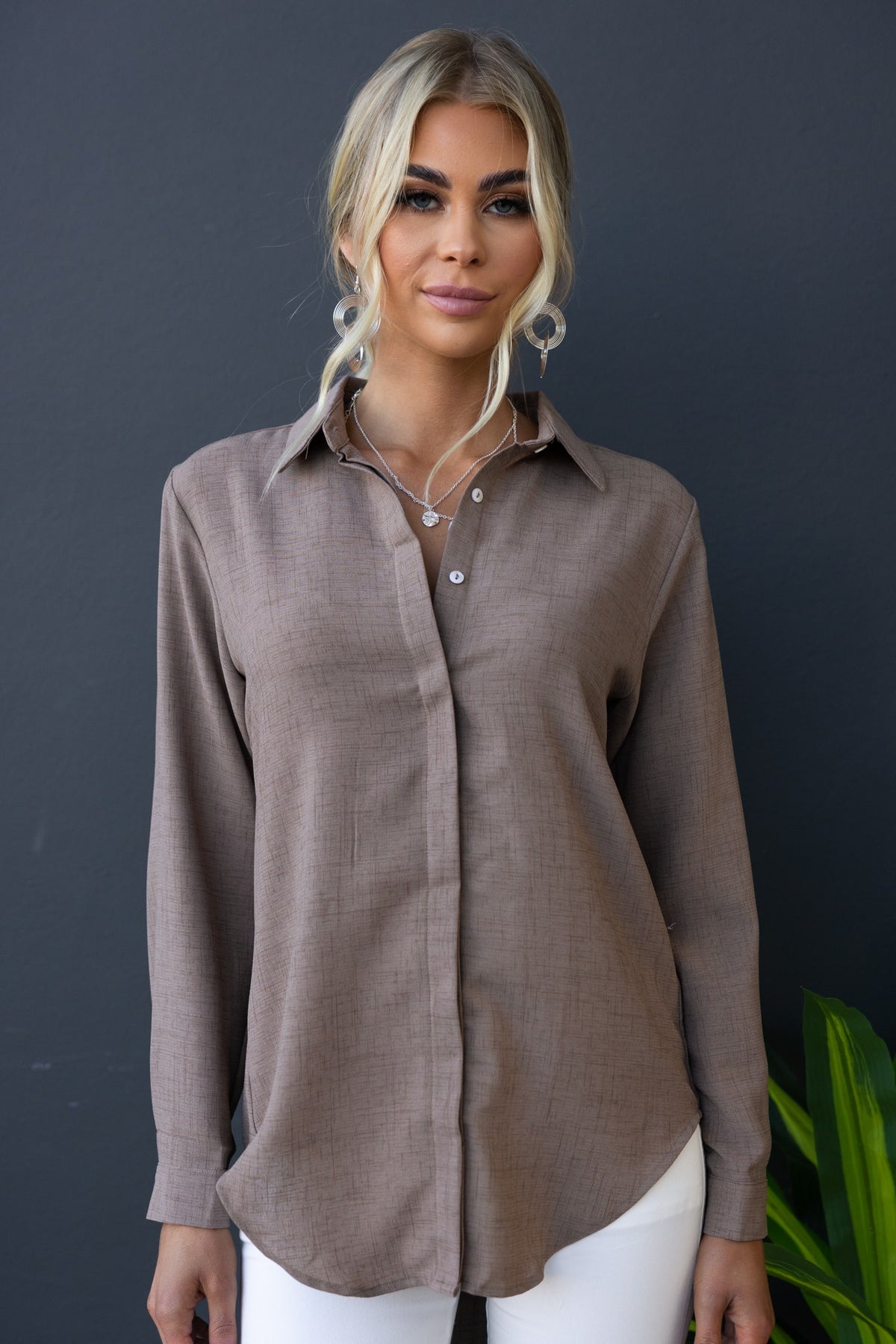 Toomba Shirt in light brown, button-up style, relaxed fit, worn by Taylah, perfect for casual and elegant occasions.