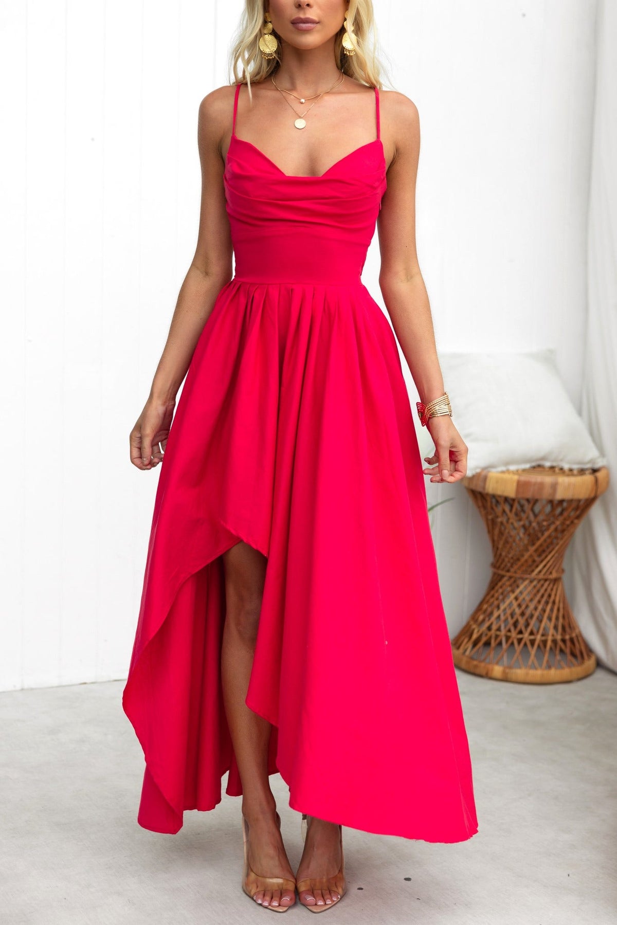Adalita Maxi Dress in vibrant pink with adjustable straps and asymmetrical hemline, perfect for summer occasions.