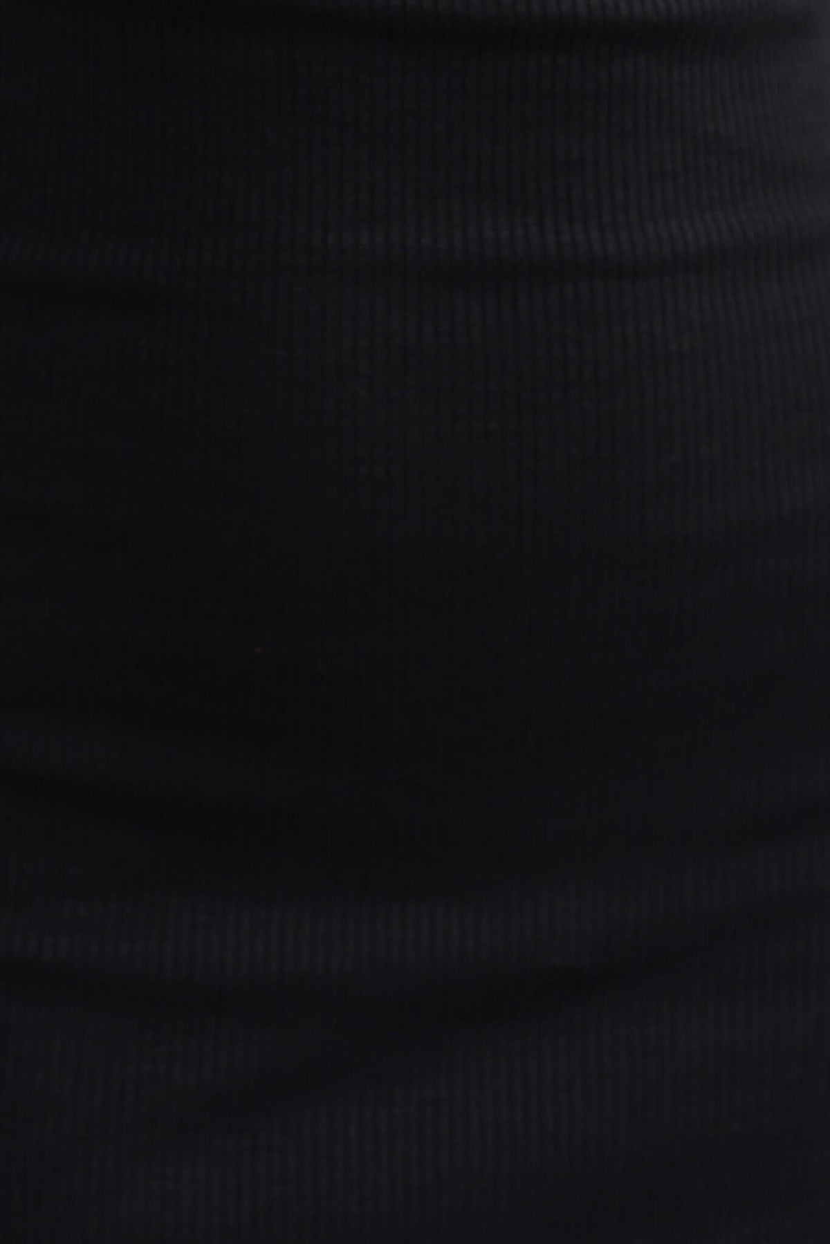 Close-up of ribbed black fabric for Judah Maxi Dress, showcasing its soft texture and stretch material.