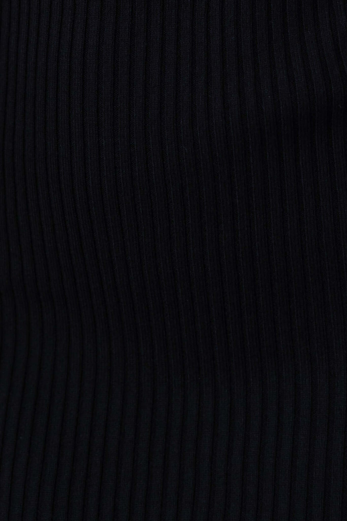 Close-up of black ribbed knit fabric, showcasing stretchy material used in the Bransley Midi Dress.
