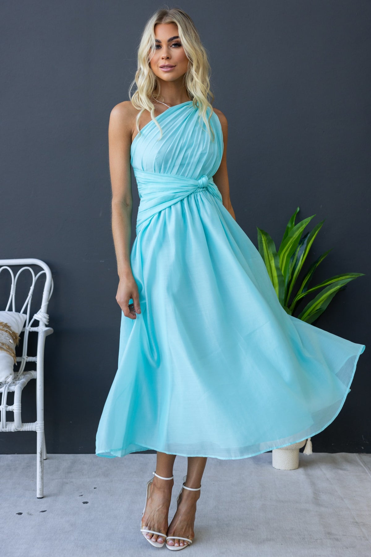 Arturo Midi Dress in aqua with one-shoulder design, flowing chiffon, and stylish knot detail, perfect for elegant occasions.