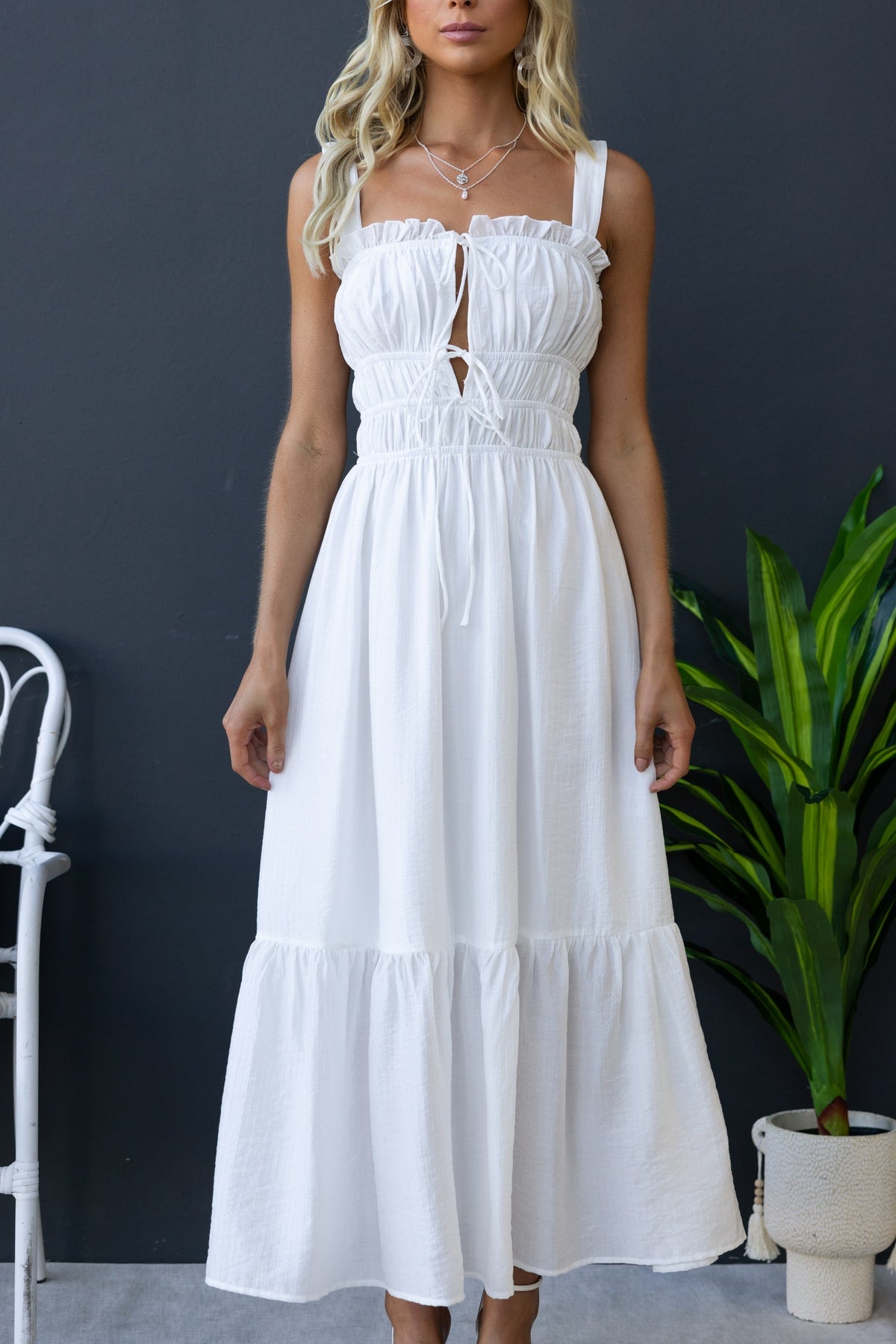 Shanina Midi Dress in white with elastic bodice, tie detail at bust, and textured lined fabric, perfect for summer.