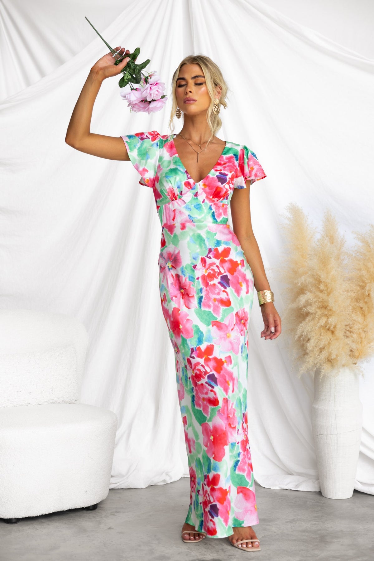 Belmont Maxi Dress: Colorful satin gown with cap sleeves, floral design, perfect for summer occasions.