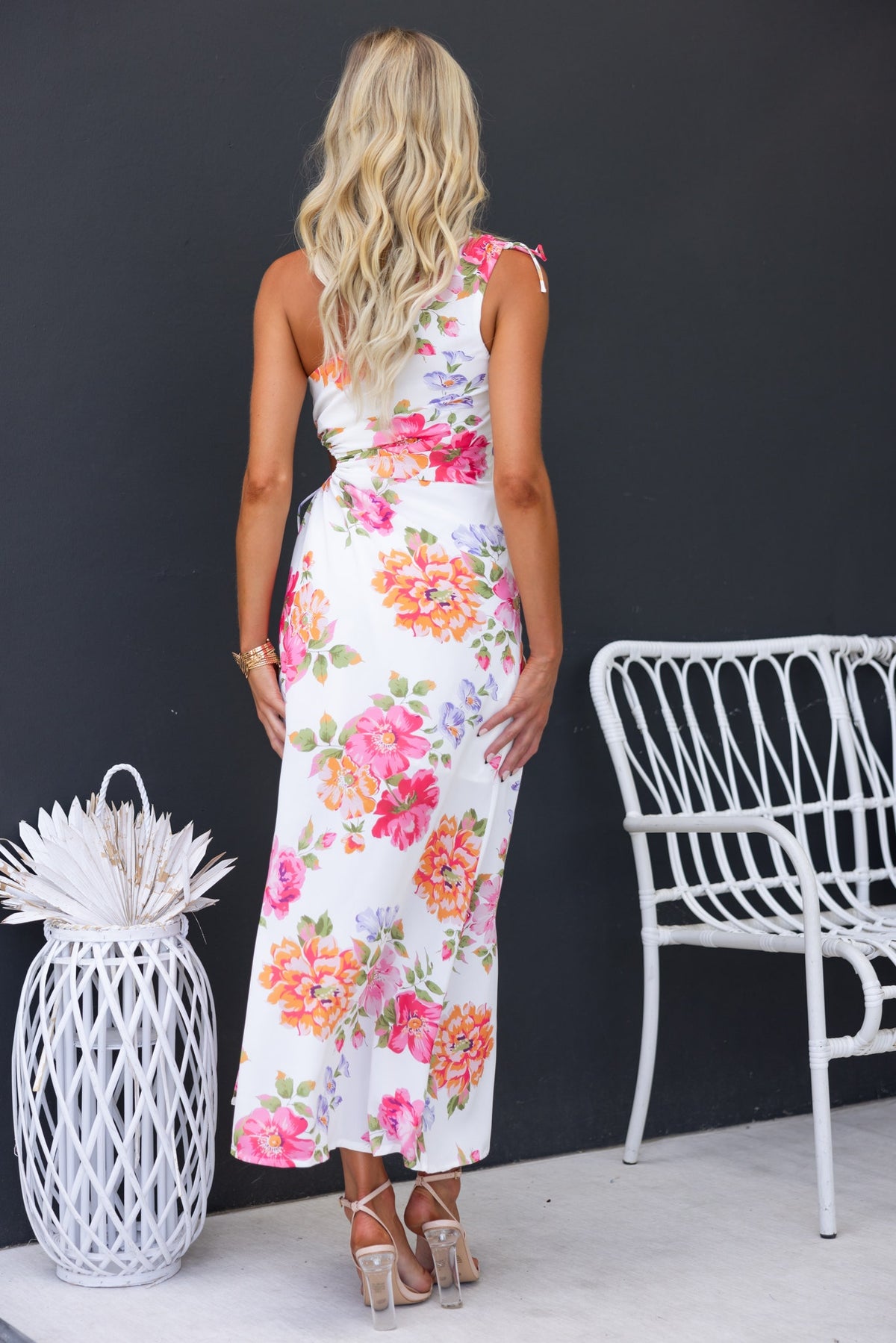 Ronan Maxi Dress featuring floral print, one-shoulder design, and side split, showcased against a sleek backdrop.