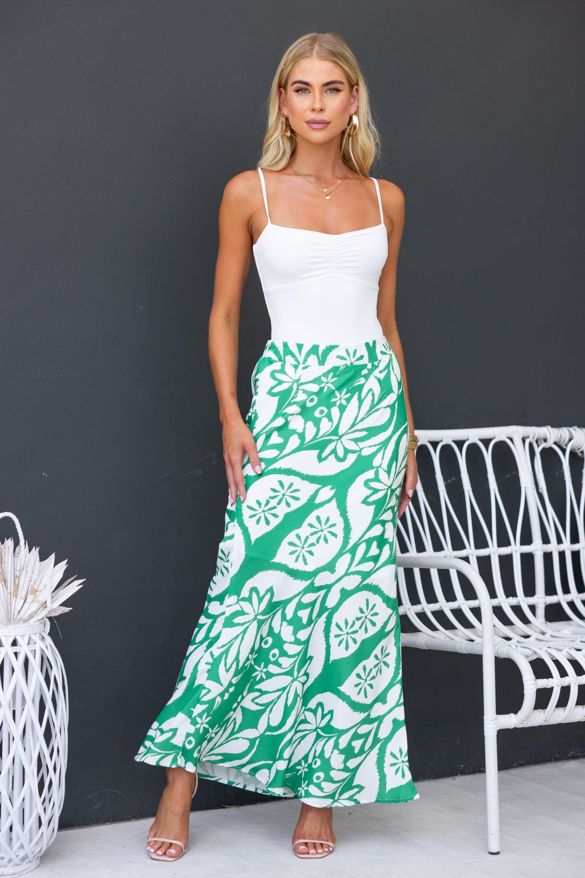 Floral print Sami maxi skirt with mid-high waist fit, paired with a white top, perfect for summer outfits.