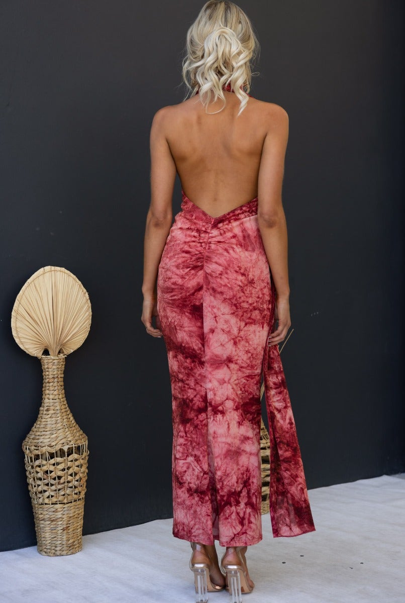 Back view of Eyona Maxi Dress in multi-colour with open back and ruched detail, showcasing a stylish and elegant design.