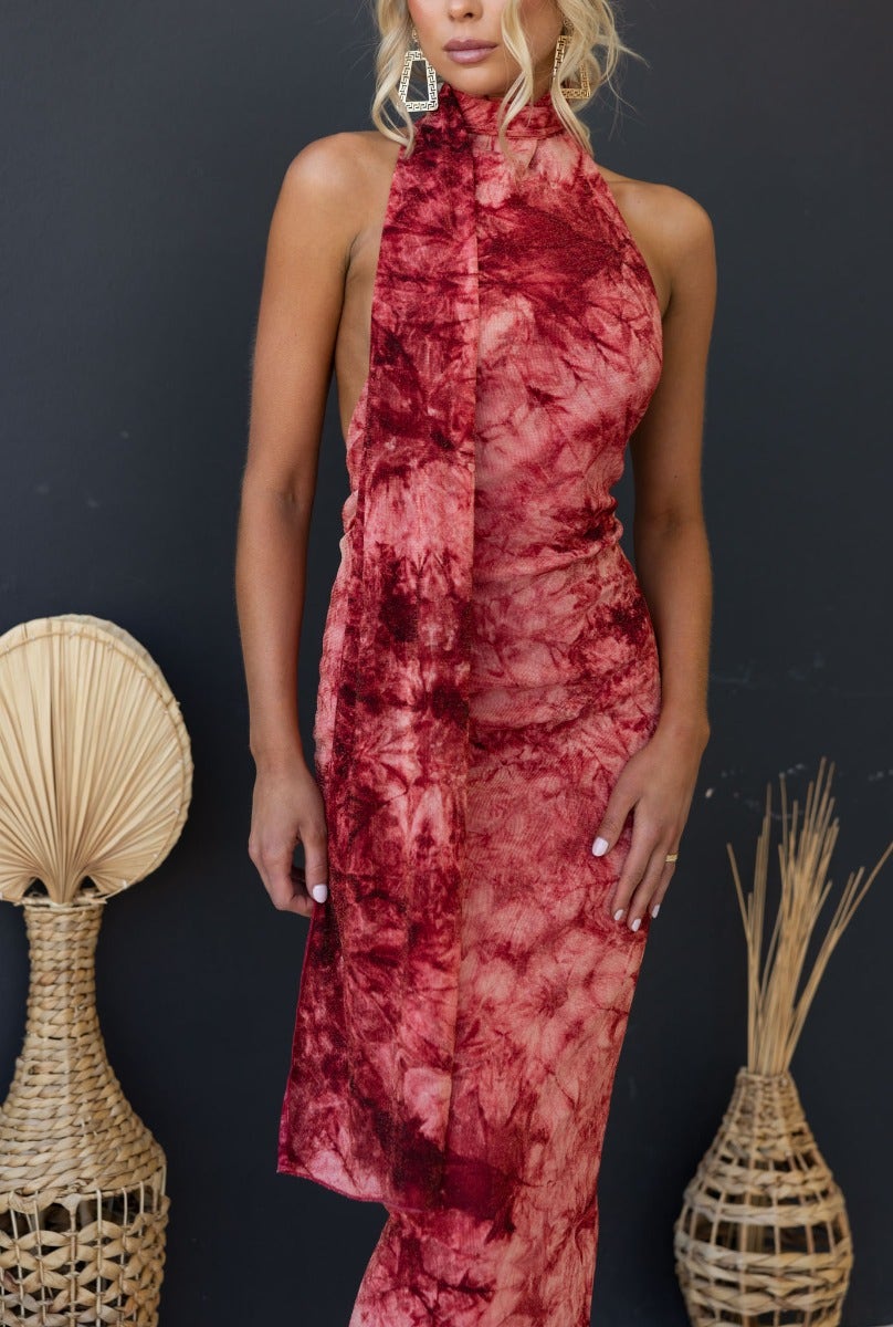 Eyona Maxi Dress in multi-colour with high neckline, open back, and intricate ruching design.