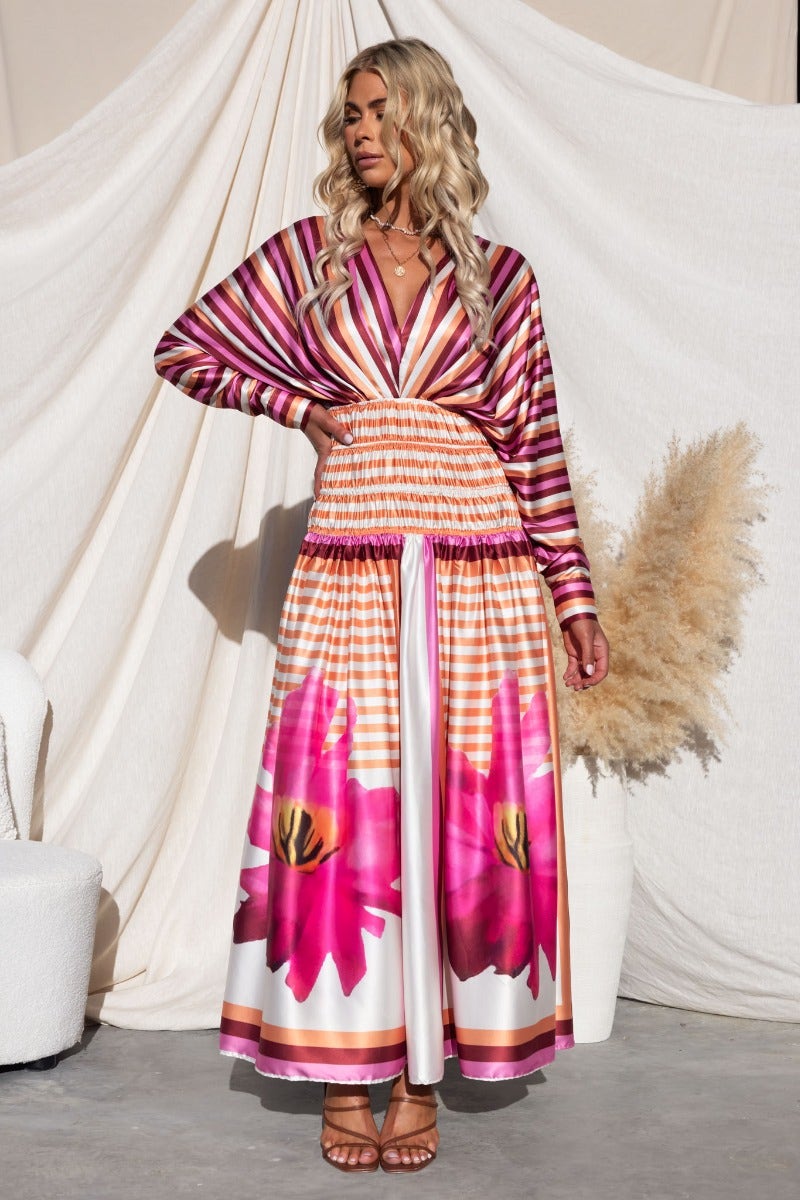 Flaria Maxi Dress featuring a multi-colour design, V-neckline, and batwing sleeves, perfect for summer events.