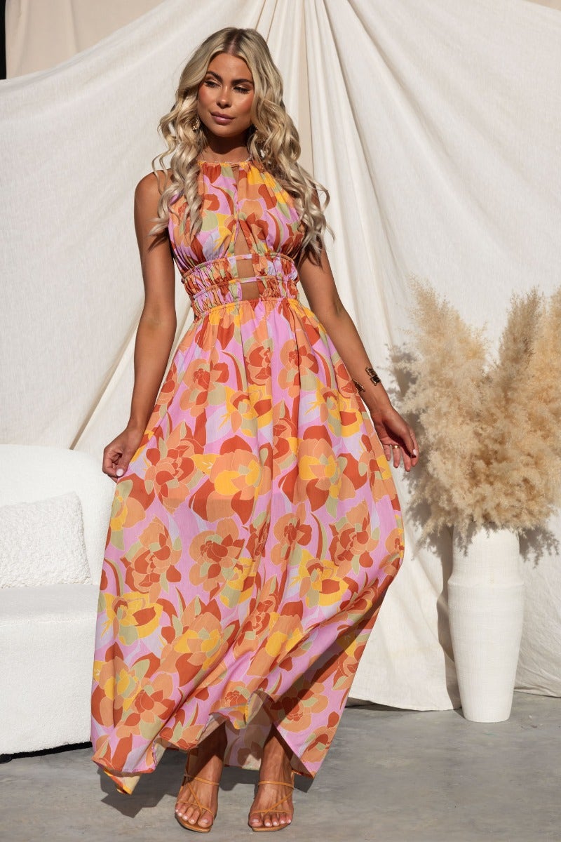 Kariah Maxi Dress in multi-colour with adjustable halter, cut-outs, and elastic waistband, perfect for summer occasions.