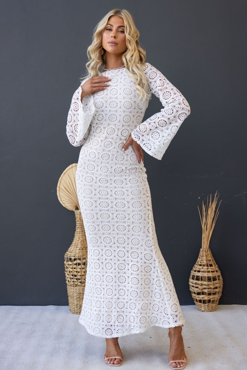 Emory Maxi Dress features a crochet design, flare sleeves, and a low cut back, perfect for a stylish summer look.