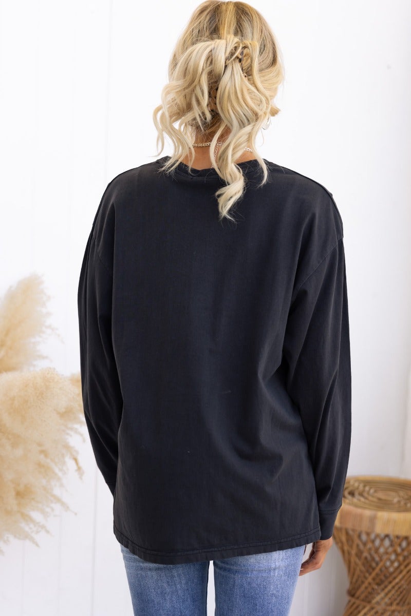 Back view of Jordin Top, a black oversized long sleeve top from All About Eve, featuring a round neckline.