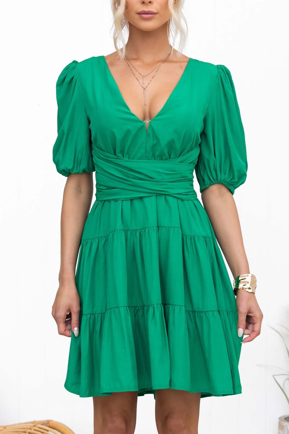 Sakura Dress in vibrant green featuring puff sleeves, V-neckline, and tiered skirt - stylish and comfortable for various occasions.