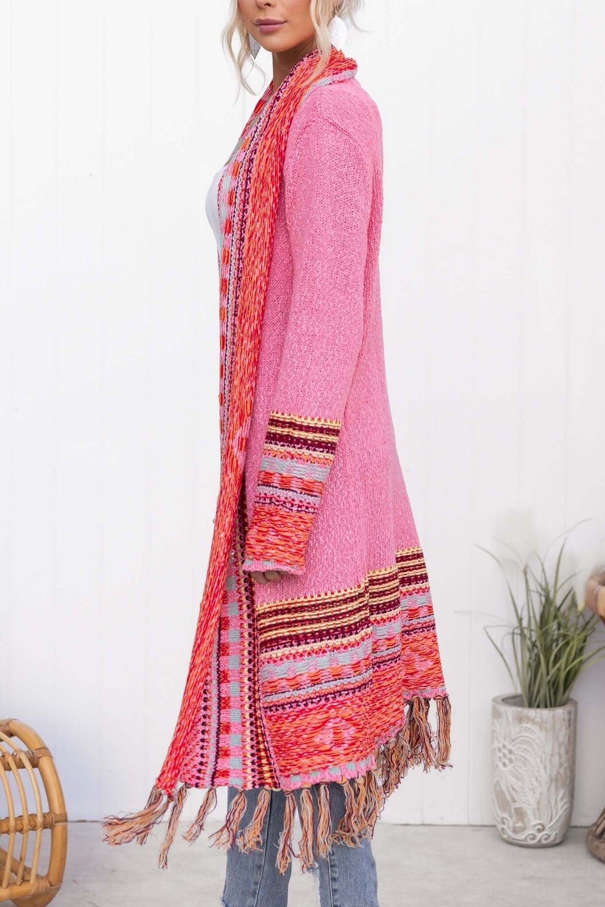 Lewis Cardigan in pink with longline fit and tassels, featured in a relaxed style and knitted material.