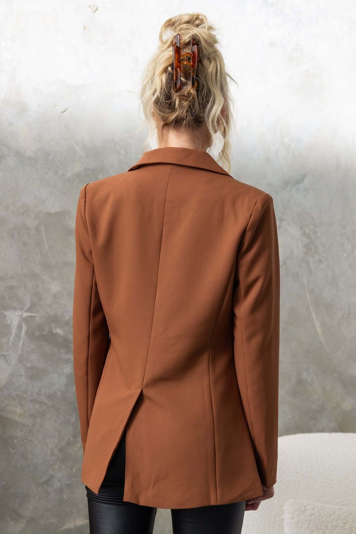 Brown Desio Blazer featuring shoulder pads, back split, and lined design, perfect for a stylish, standard fit.