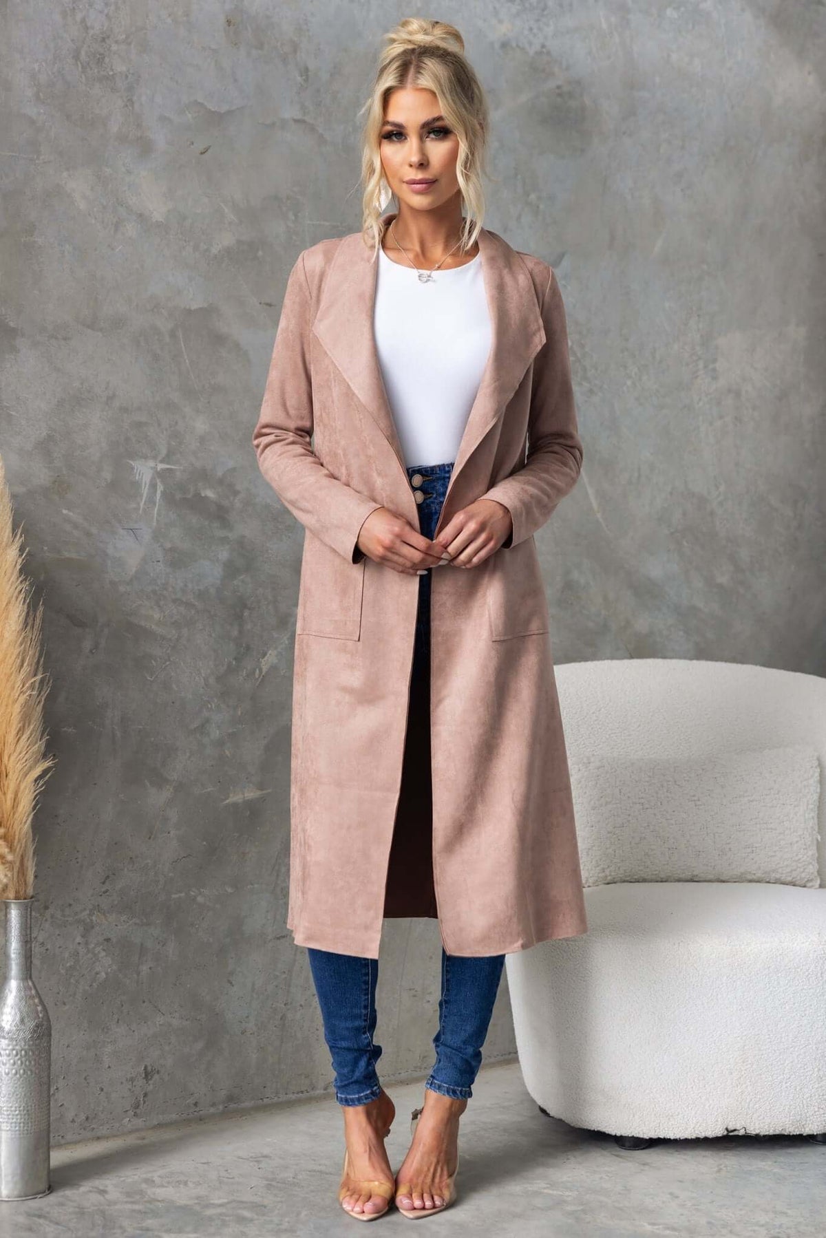 Elegant longline Hayley coat in suede look with draping lapel, styled with blue jeans and heels.