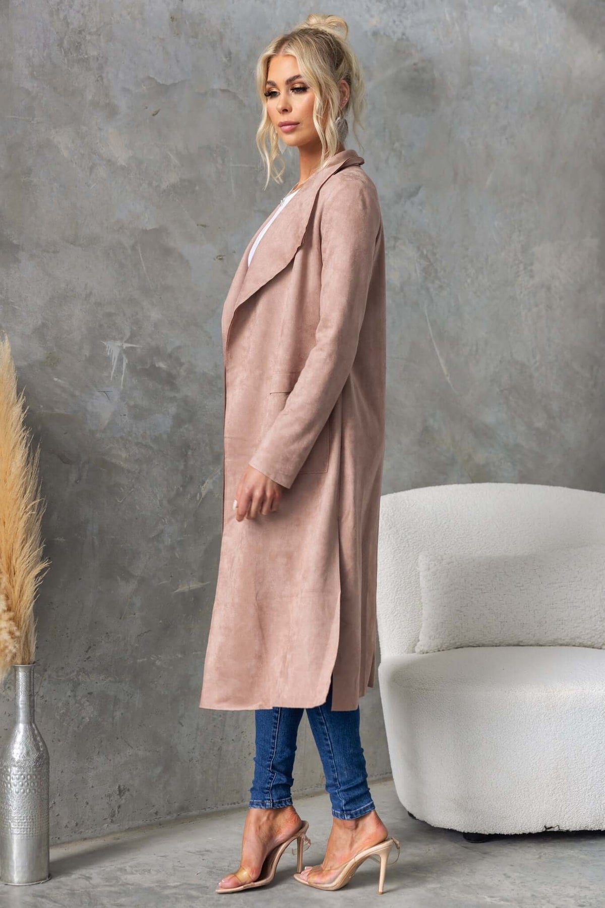Side view of the Hayley Coat in soft suede look, featuring a longline fit with draping lapel and side slits.