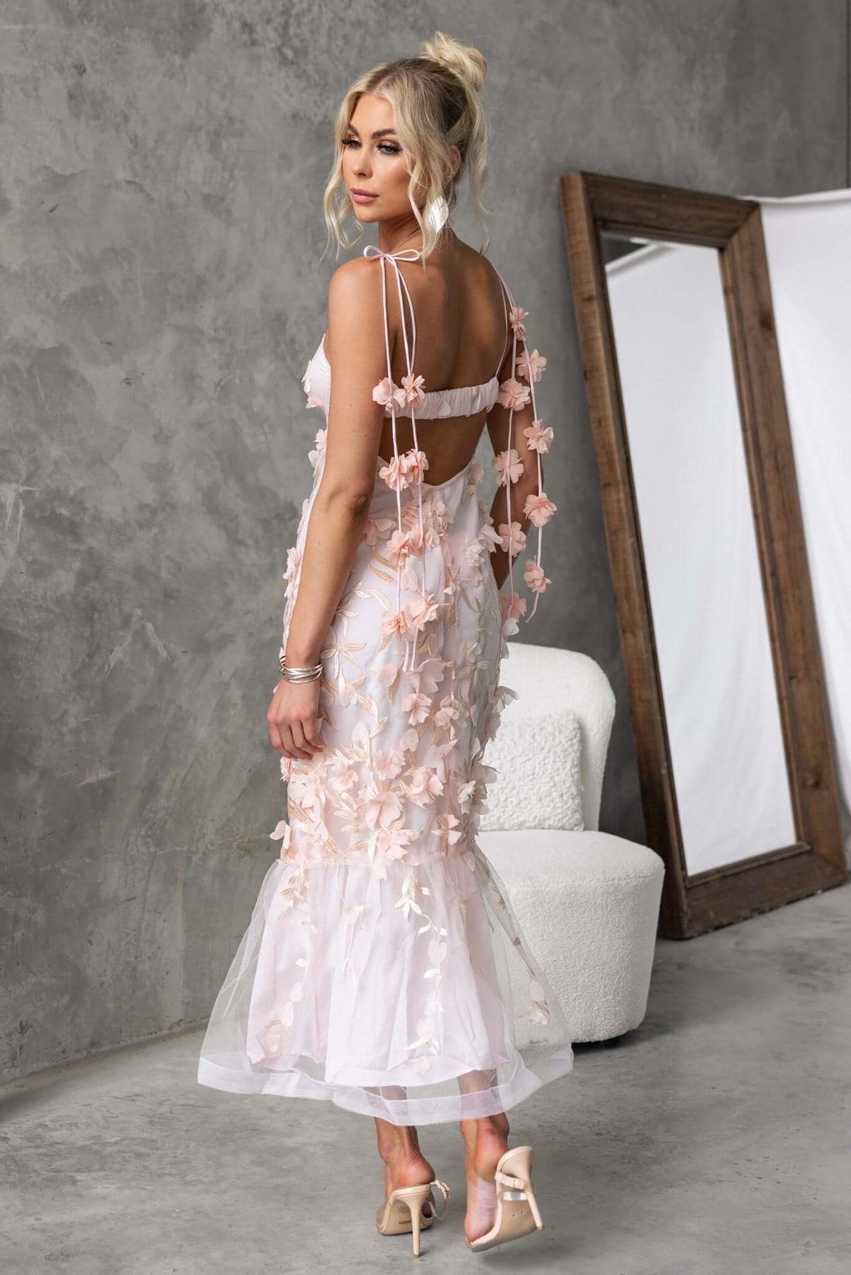 Back view of Nephi Midi Dress with lace overlay and floral embroidery, perfect for stylish occasions.