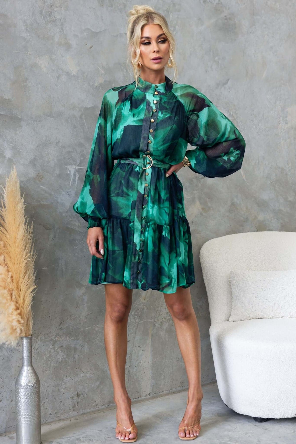 Orazio Dress in green chiffon with high neckline, button-up front, and elastic cuffs, styled with a removable belt.