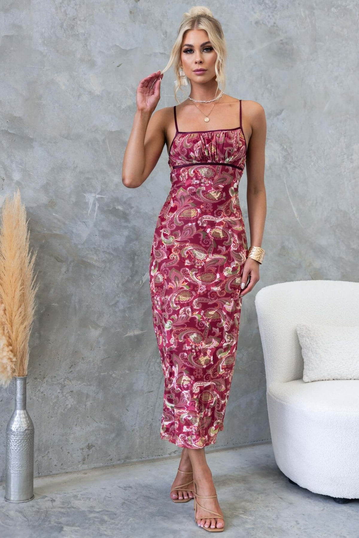 Model wearing the Poet Maxi Dress with adjustable straps and velvet-embossed mesh in a vibrant print.