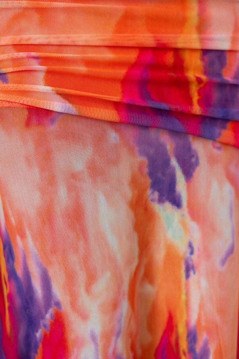 Close-up of colorful orange, purple, and pink fabric showcasing the ruching detail of the Obvious Maxi Dress.