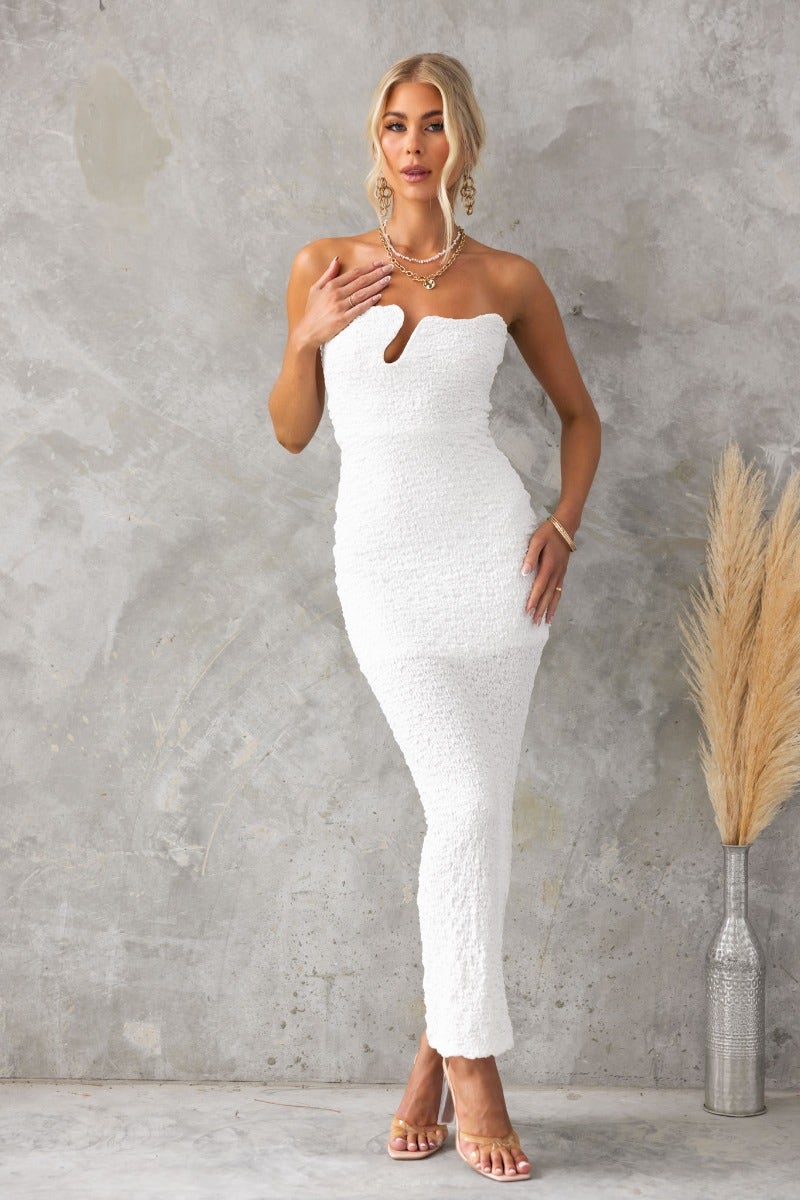 Stylish Hollywood Maxi Dress in white, featuring a strapless design with textured material and a mid-thigh lining.