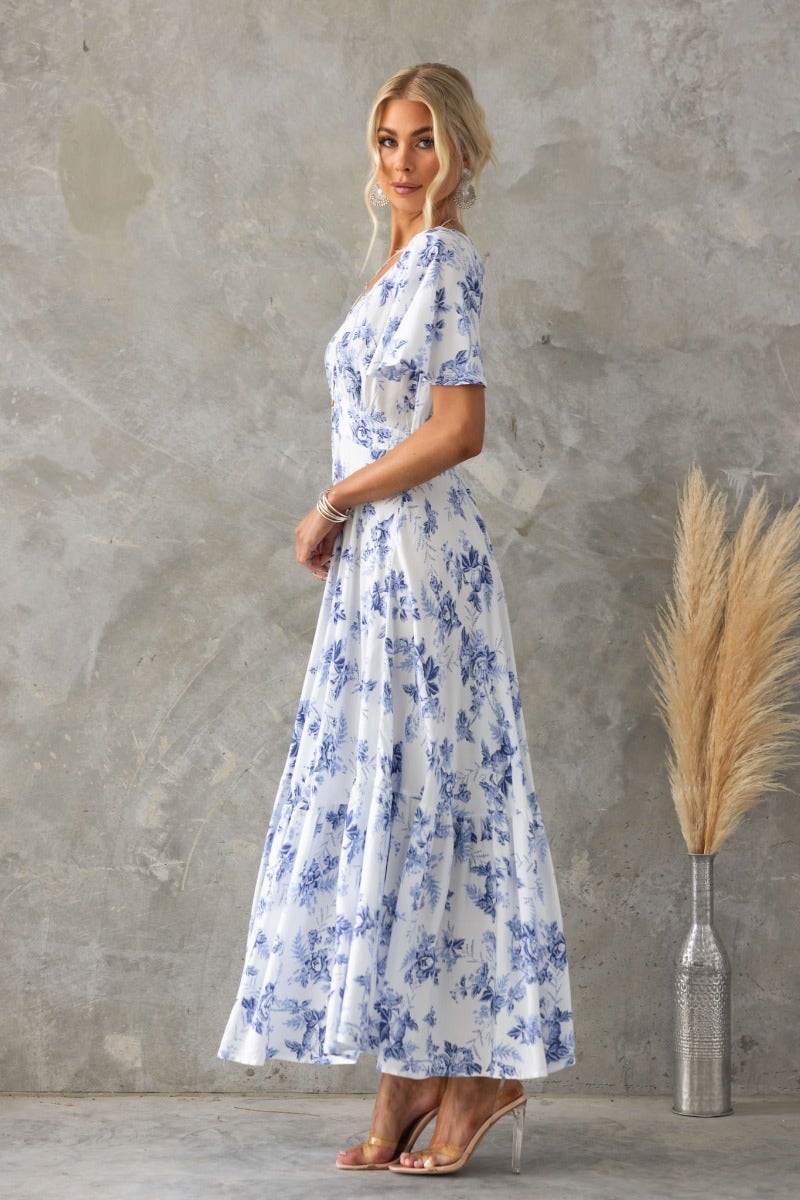 Side view of the Nashville Maxi Dress, featuring a floral print and V-neckline, perfect for casual summer outings.