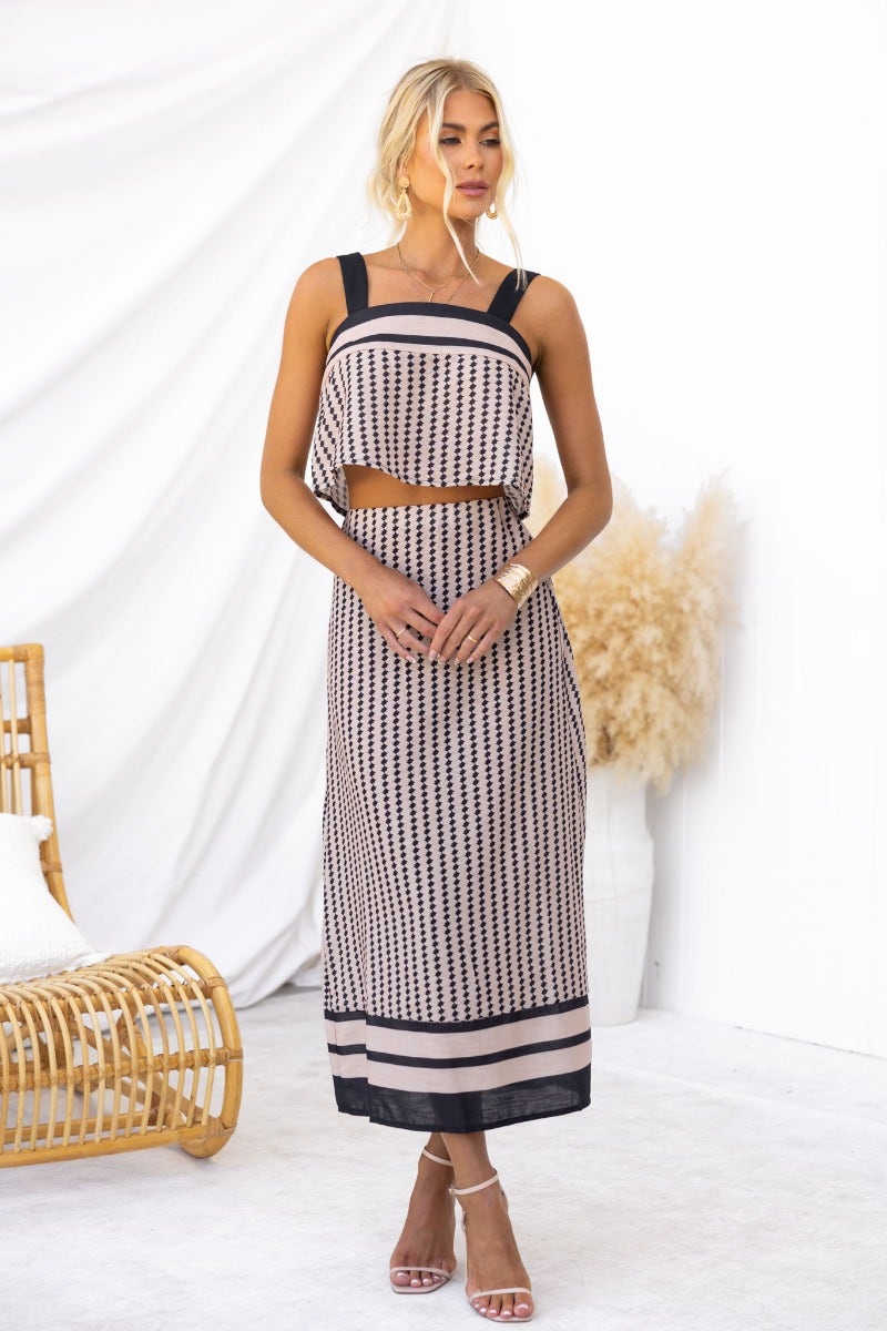 Day By Day Set featuring a square neckline and midi skirt, showcasing a light cotton feel in a chic design.