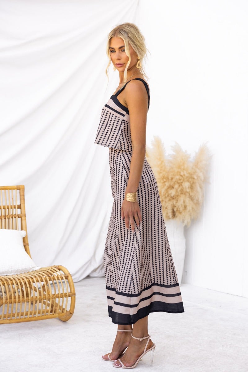 Model wearing Day By Day Set with square neckline and stylish midi skirt, showcasing light cotton feel and mid-high waist fit.