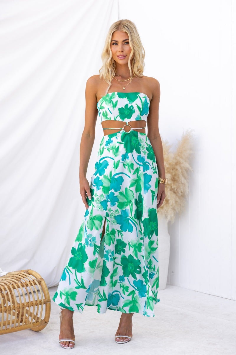 Zanita Maxi Dress featuring floral print, strapless style, and cut-out waist detail, ideal for summer occasions.