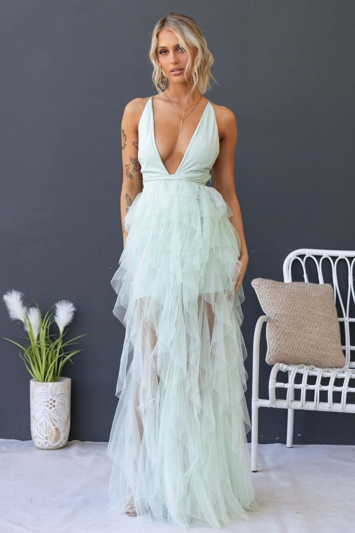 Salinas Maxi Dress in mint green with V-neckline and tulle ruffle skirt, perfect for special occasions.