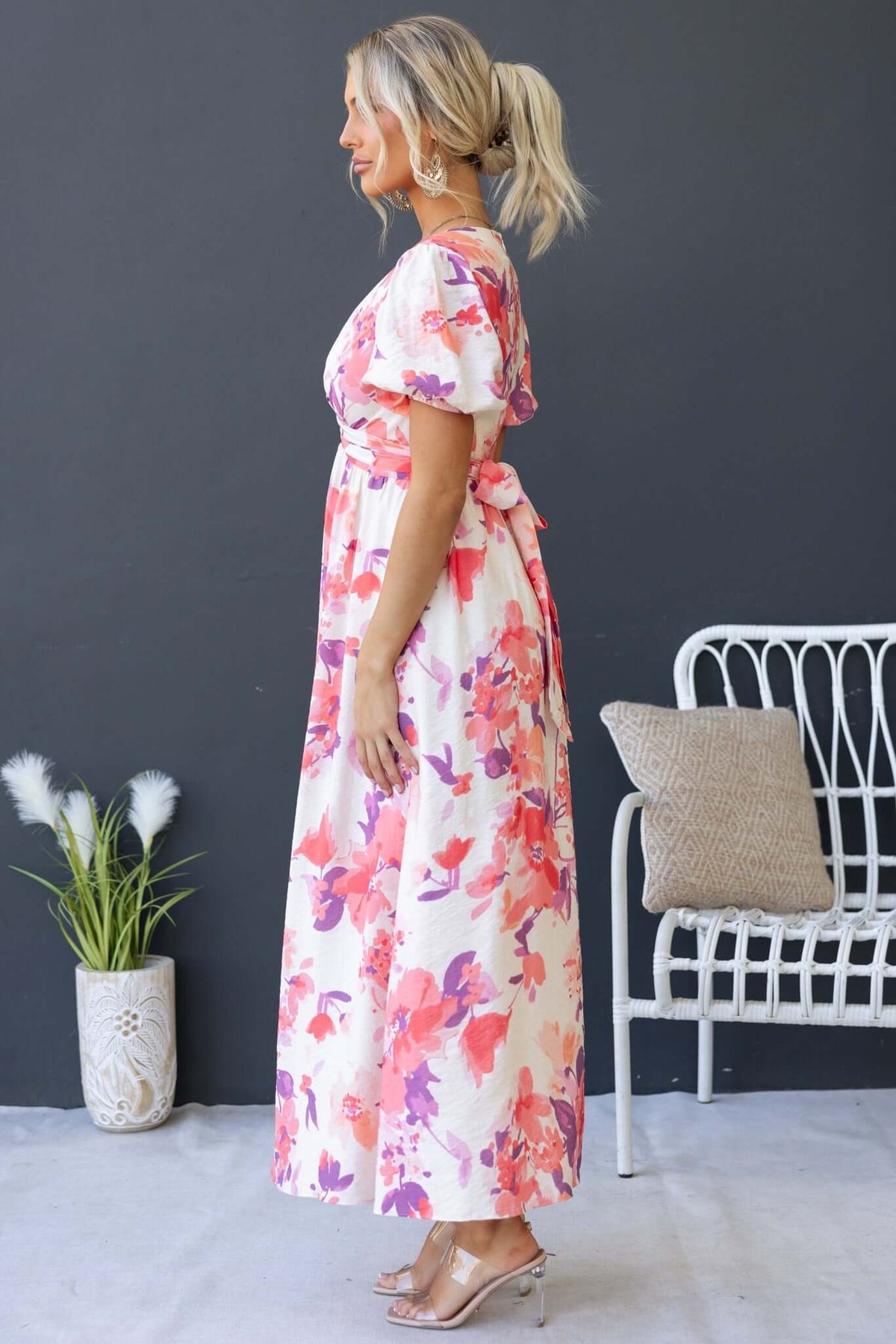 Tinsley Maxi Dress in floral print, featuring a V-neckline, tie waist, and elastic cuffs, perfect for summer occasions.