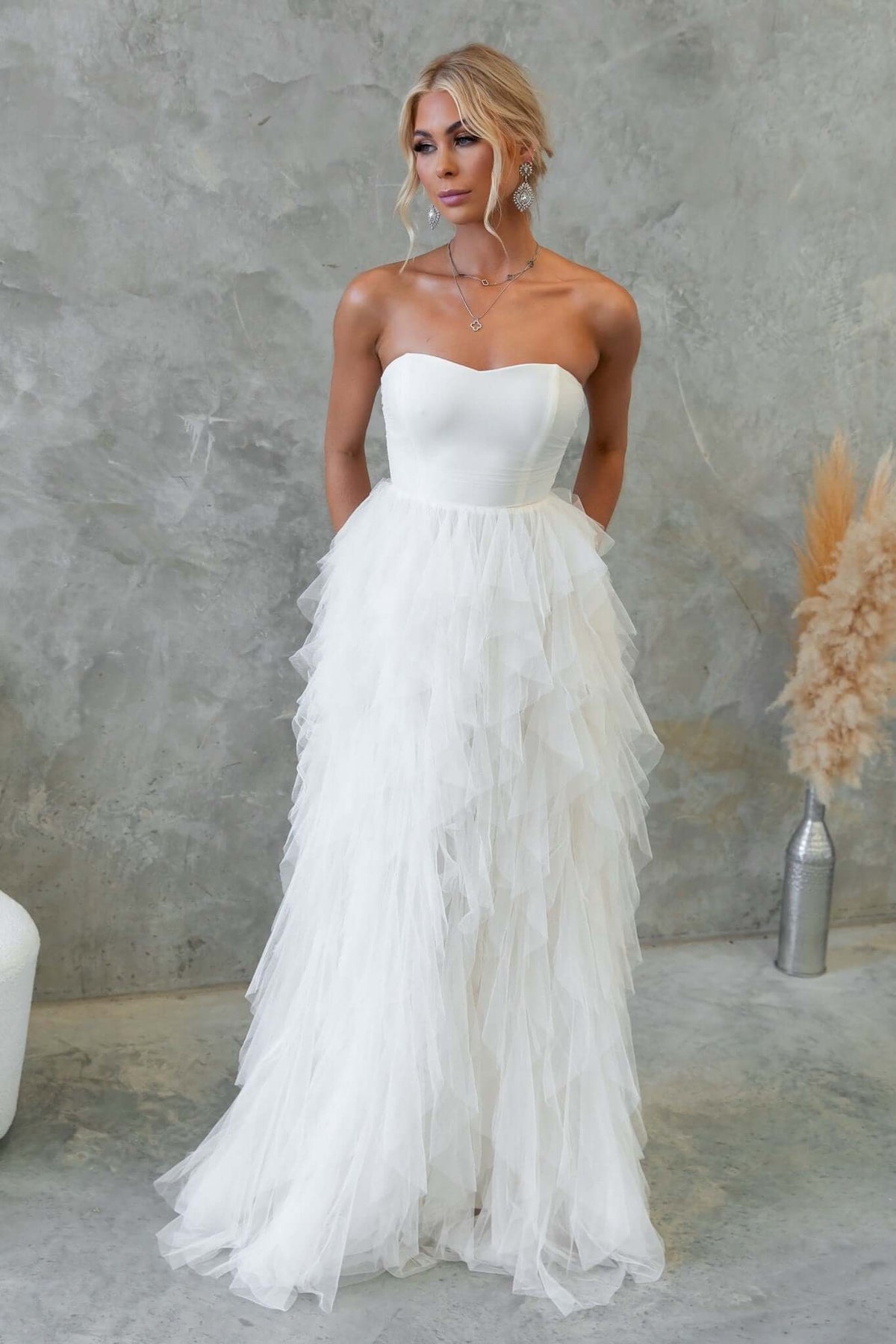 Elegant strapless Carrie Maxi Dress with tulle overlay, featuring anti-slip bust and boning for support.