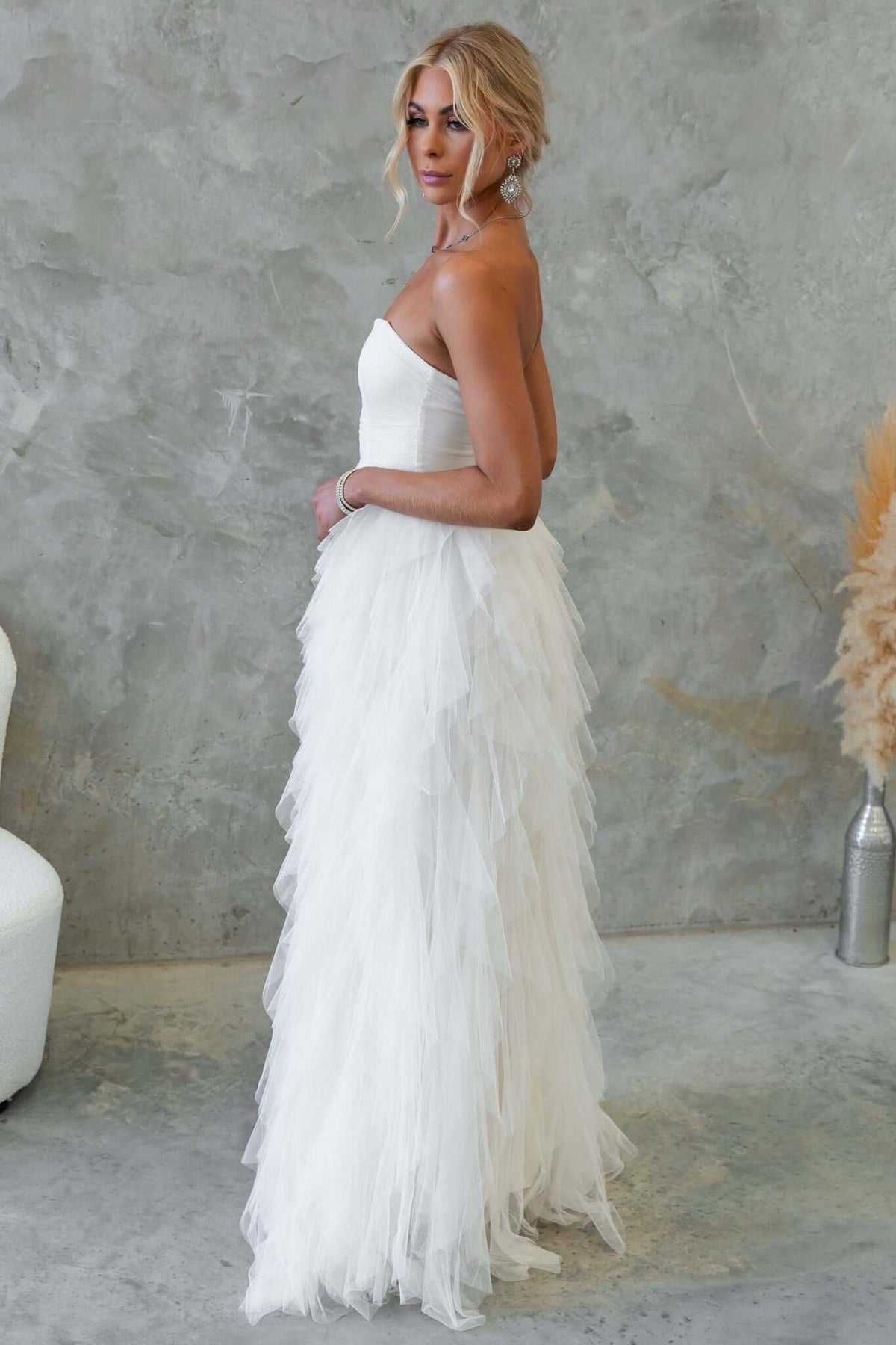 Elegant strapless Carrie Maxi Dress with tulle overlay, showcasing a timeless design for formal occasions.