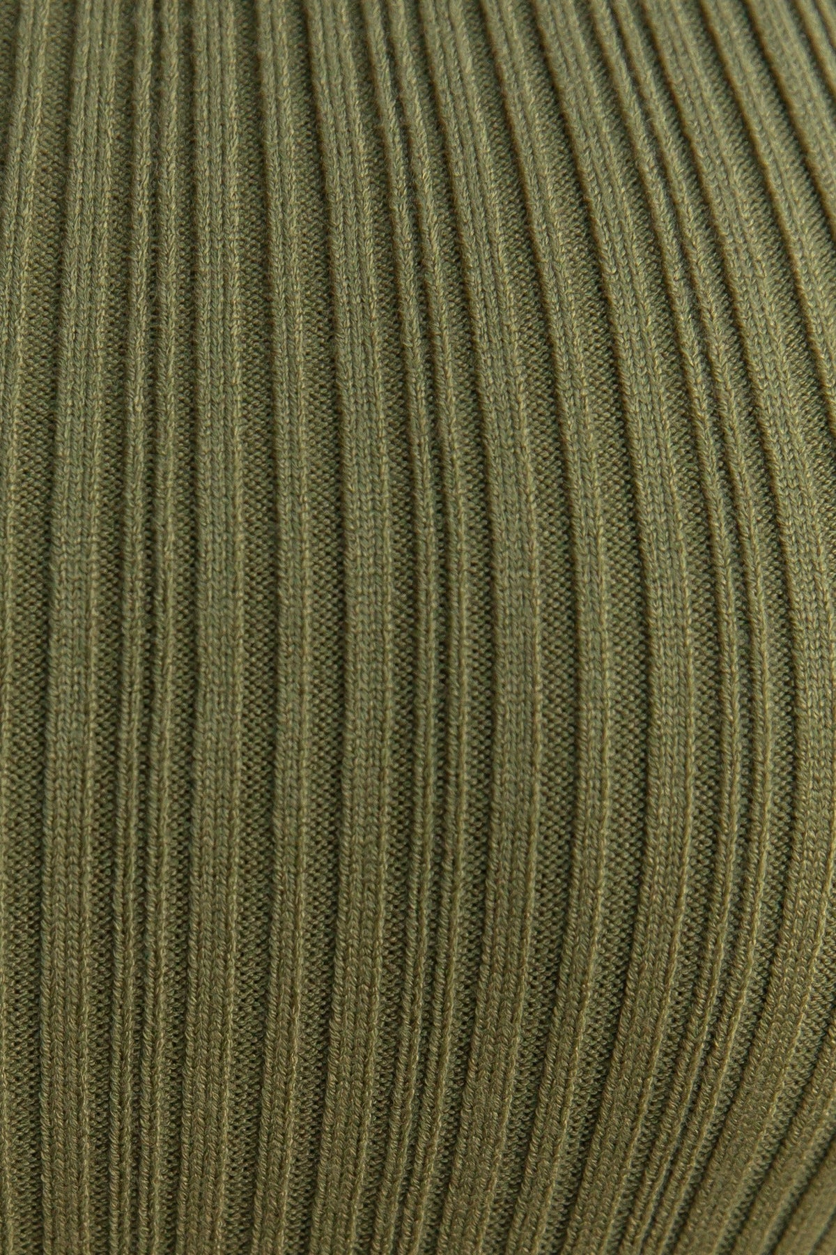 Ribbed knit texture in olive green, showcasing stretch material ideal for a fashionable top.
