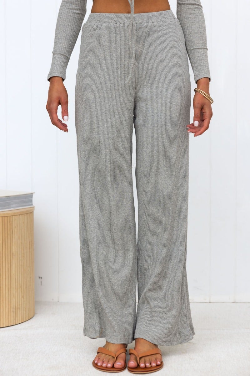 Stylish ribbed knit Smitten Pants featuring a wide leg design and elastic waistband in a cozy gray color.