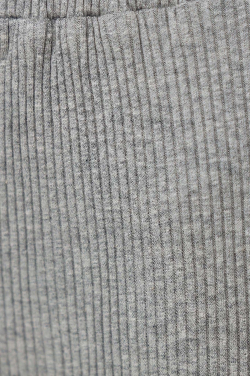Close-up of Smitten Pants showing ribbed knit texture and elastic waistband