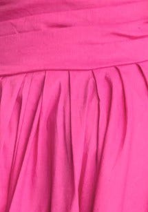 Close-up view of the pink fabric pleating on the Horizons Maxi Dress, showcasing its elegant design and texture.