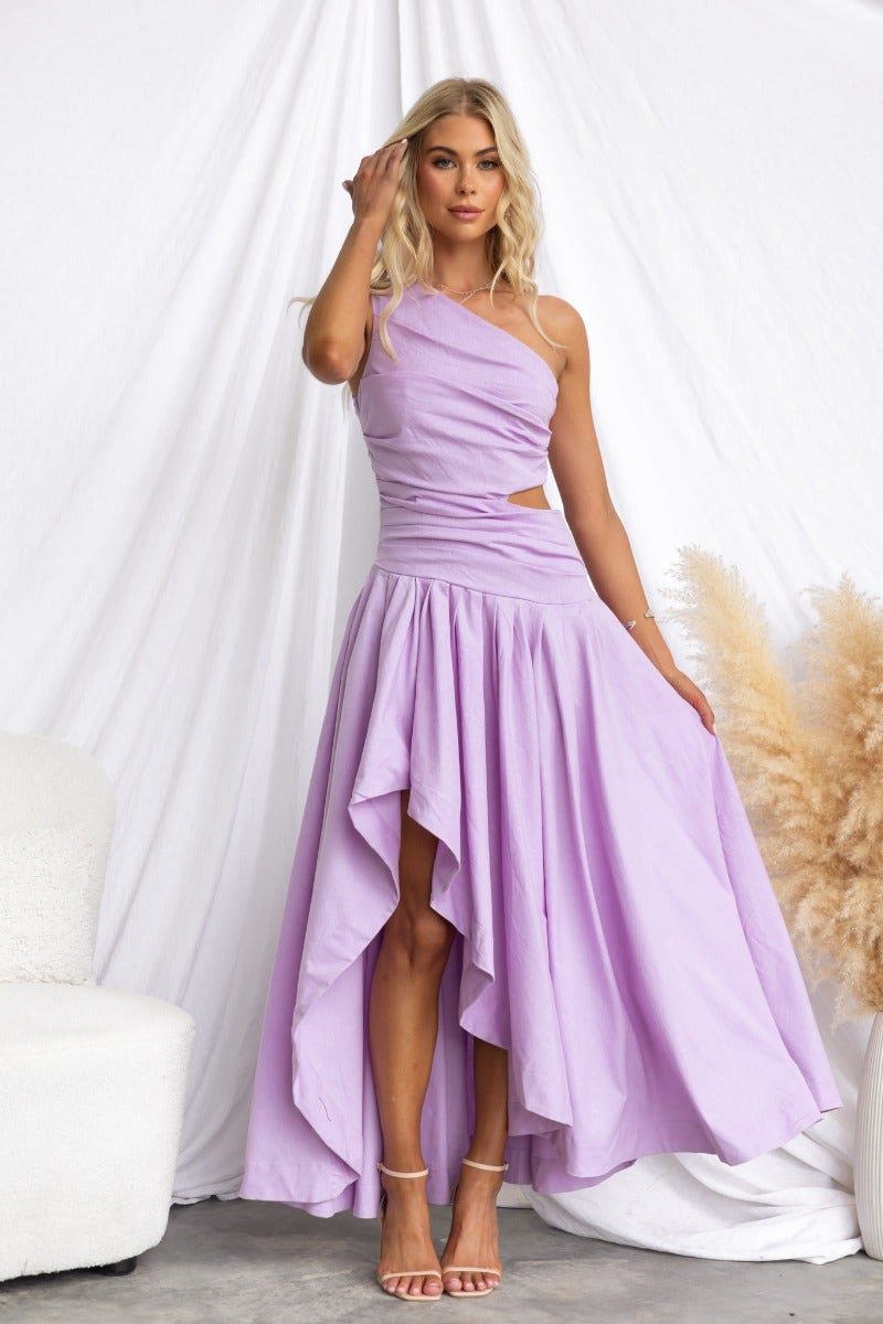 Horizons Maxi Dress in lavender, featuring a one-shoulder neckline, cut-out waist, and asymmetrical hemline.