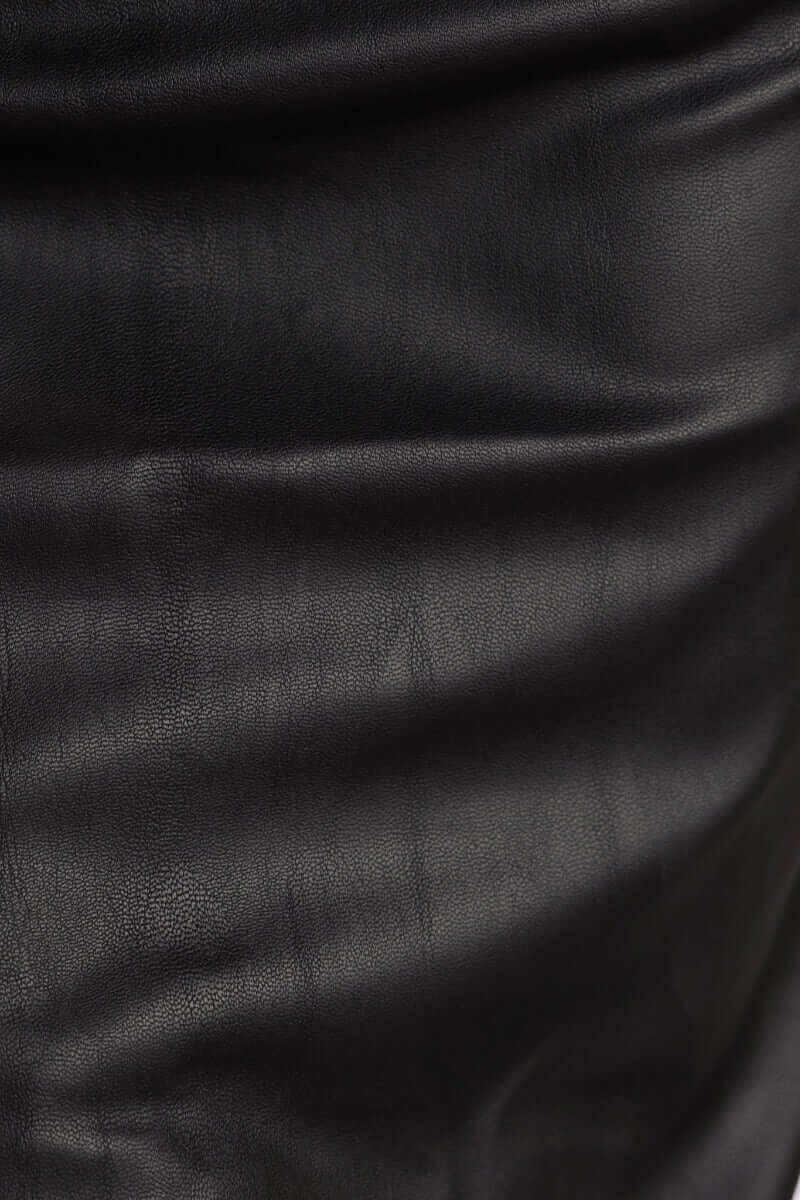 Close-up of the Uvonn black faux leather midi skirt fabric, showcasing its smooth texture and elegant appearance.