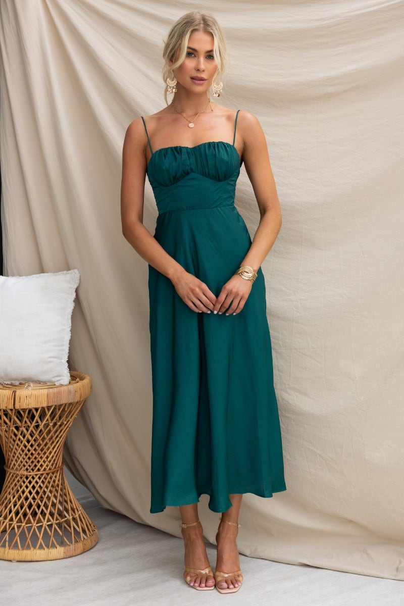 Allion Green Midi Dress with adjustable straps and gathered bust detail, styled on a model.