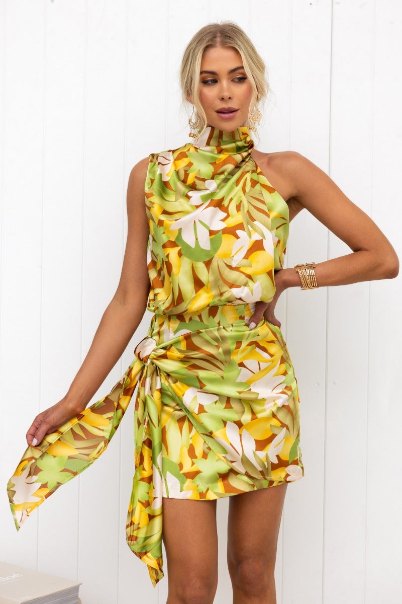 Satin Venus Dress with high neckline and wrap tie detail, featuring a vibrant floral pattern and a relaxed fit.