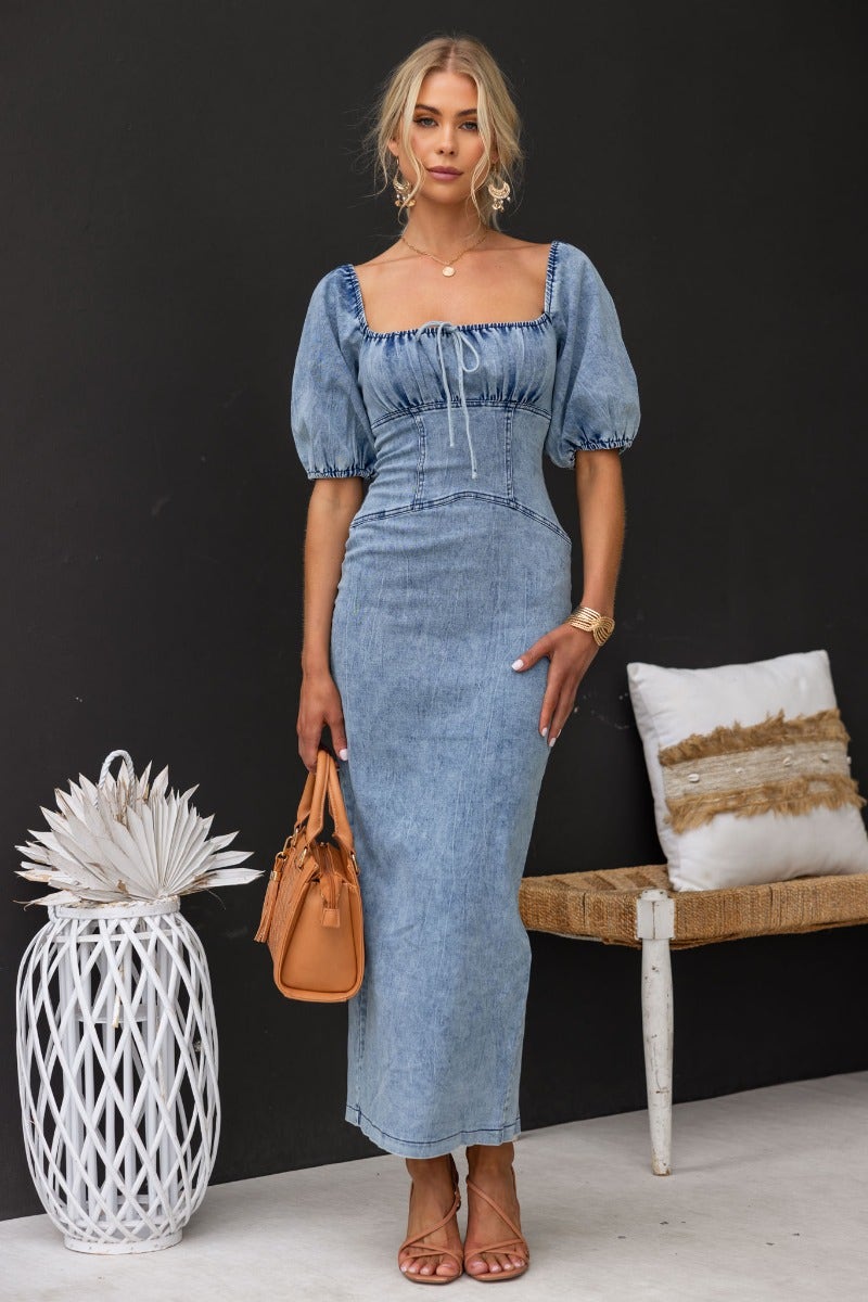 Irving Denim Maxi Dress featuring elastic neckline, tie detail at bust and split back, perfect for a stylish summer look.