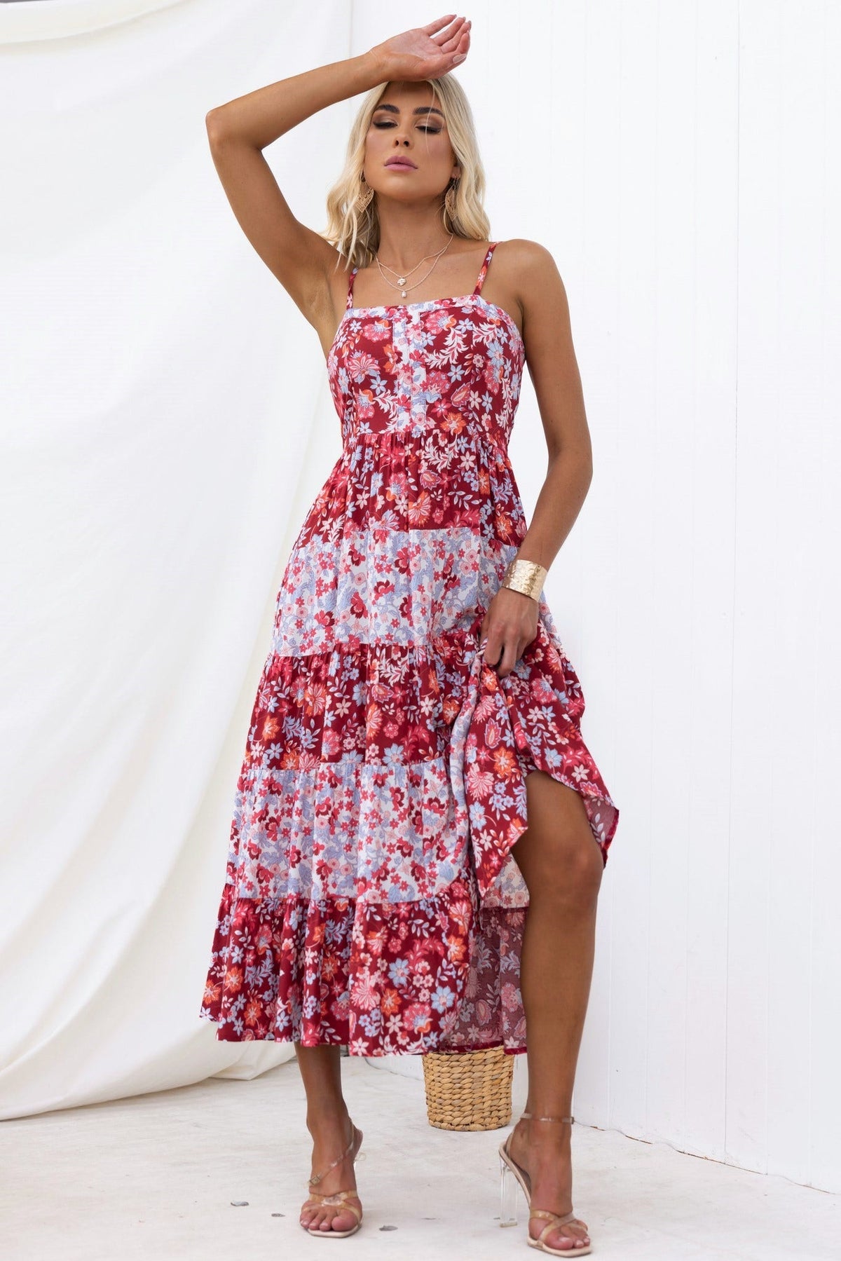 Stylish Aryana Midi Dress with adjustable straps and floral print, ideal for summer outings.