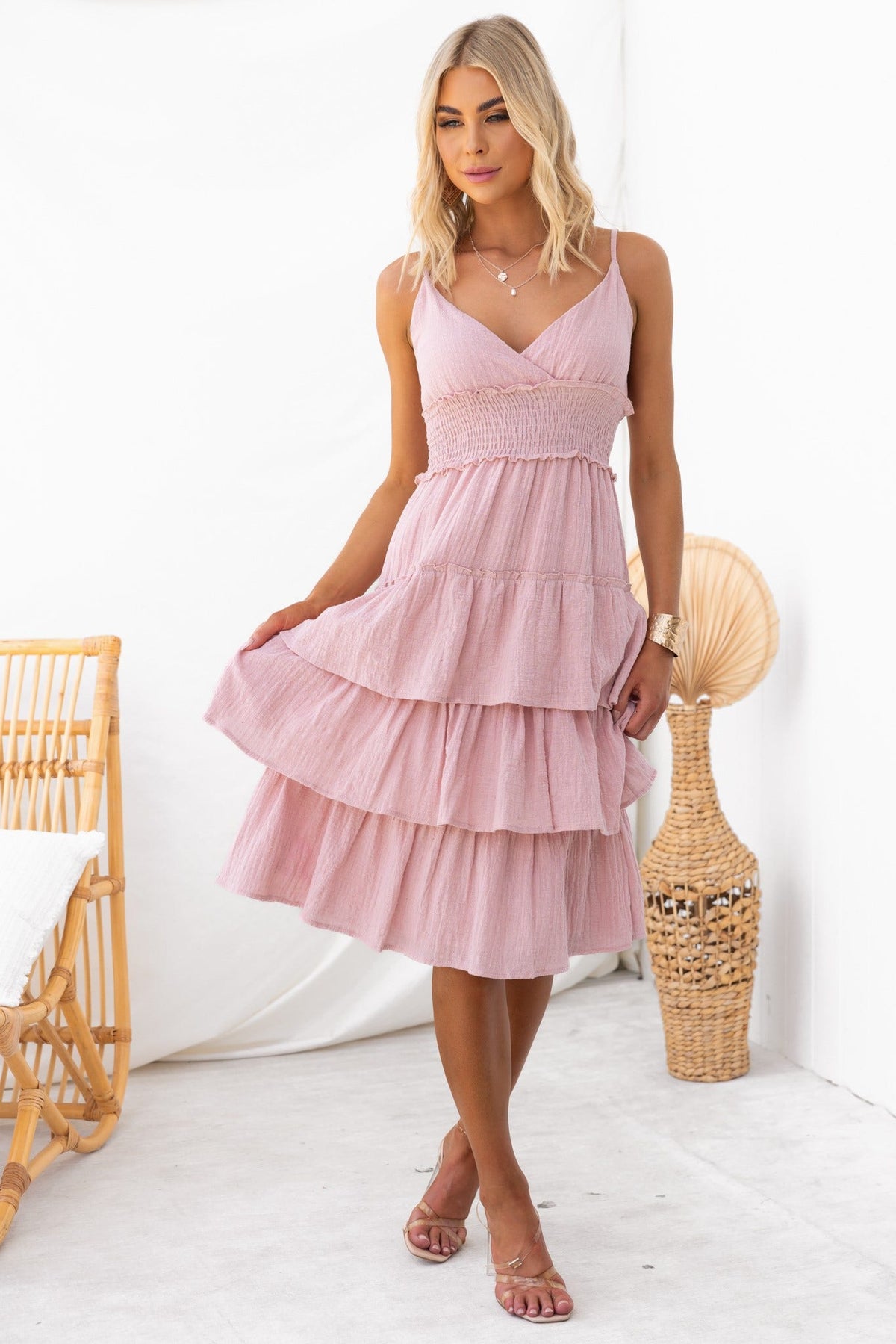 Jorge Midi Dress in soft pink with adjustable straps, flared tiered design, and elastic waistband, perfect for summer outings.