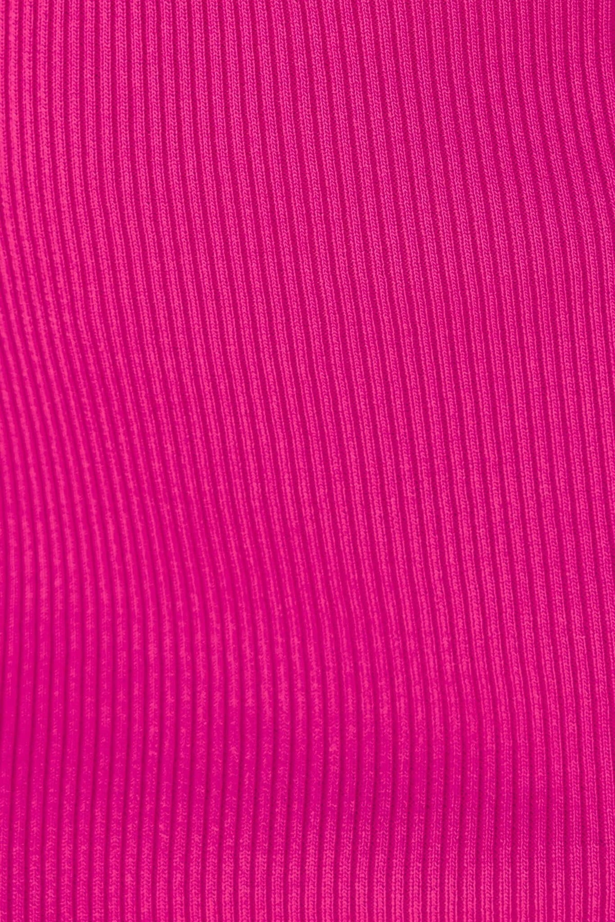 Close-up of vibrant pink ribbed fabric texture, ideal for stylish garments like dresses.