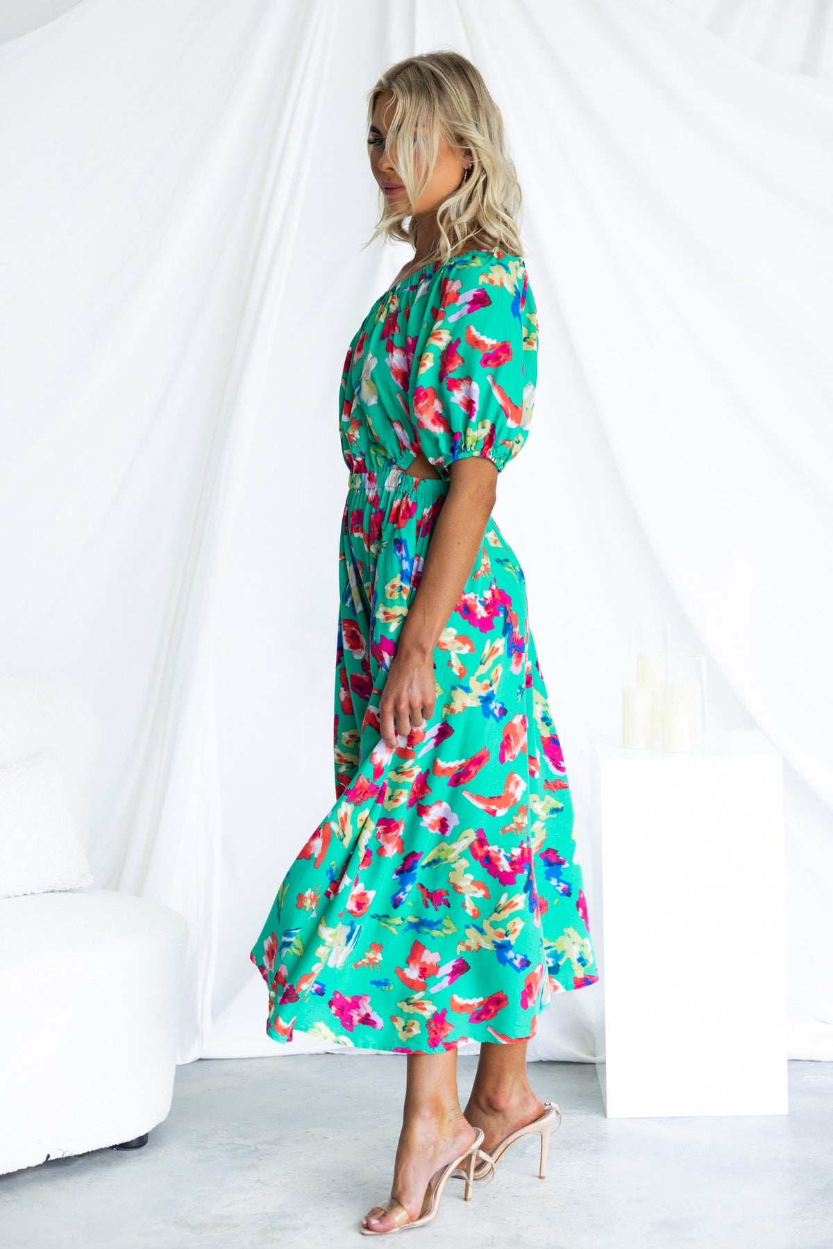 Stylish green Charmayne Midi Dress with floral print, one-shoulder neckline, elastic details, and pockets.