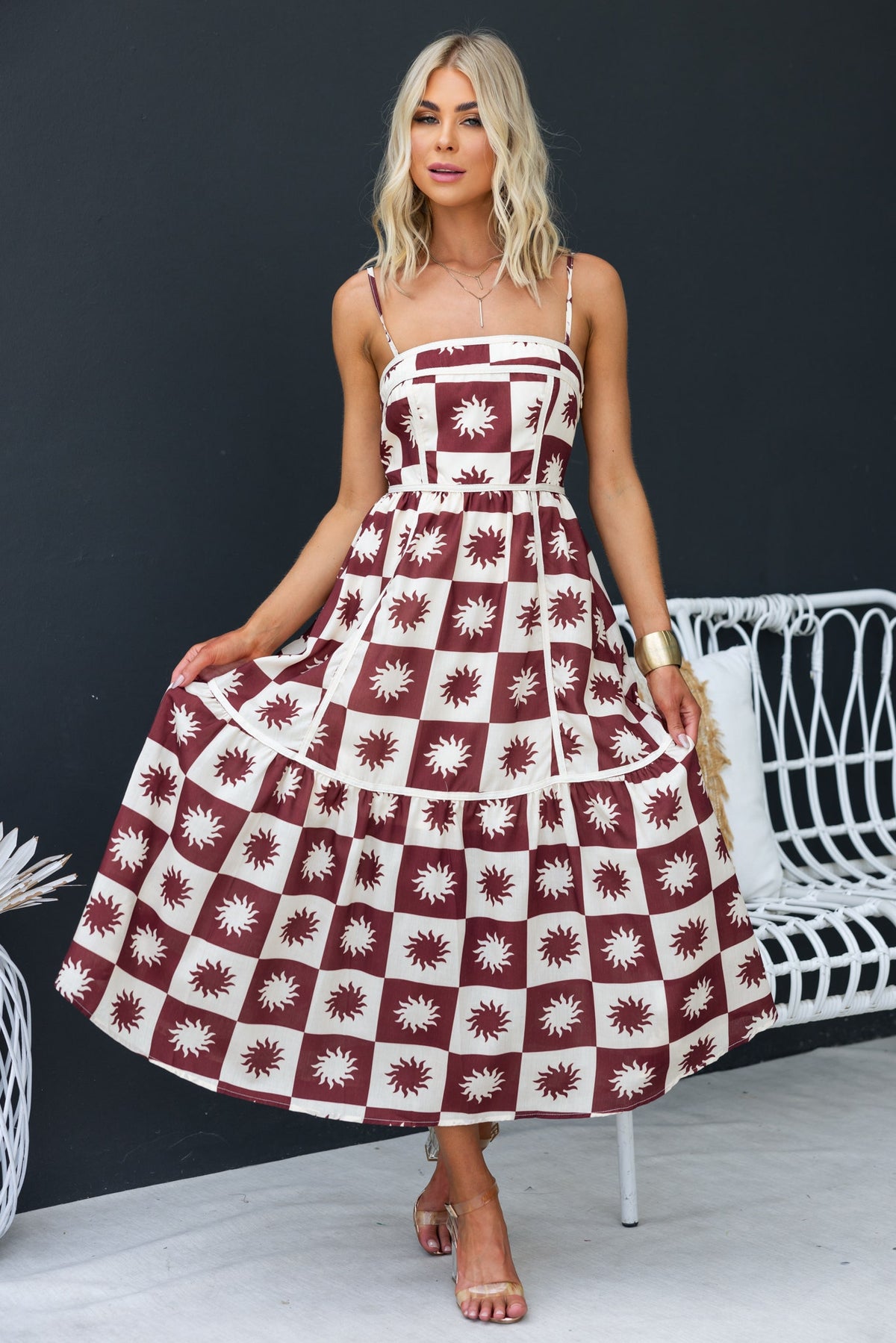 Cianna Midi Dress with adjustable straps in burgundy and cream floral print, perfect for summer outings.