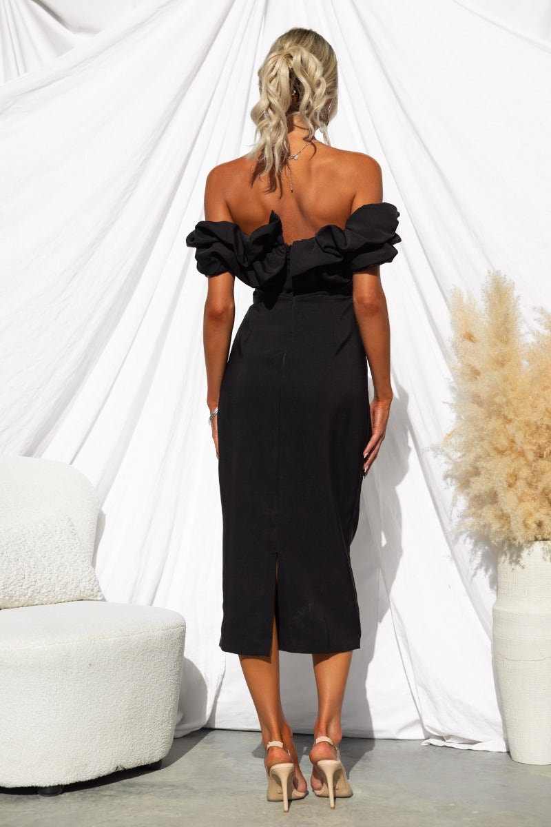 Elegant black off-shoulder midi dress featuring a back split and ruffled sleeves, perfect for formal occasions.