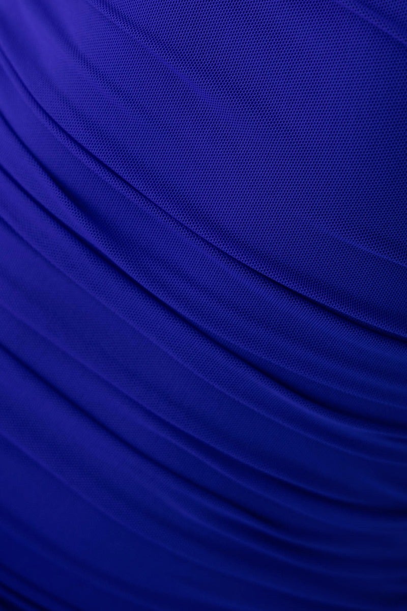 Close-up of draped mesh overlay in vibrant blue, showcasing stretchy fabric and texture, ideal for a midi dress.